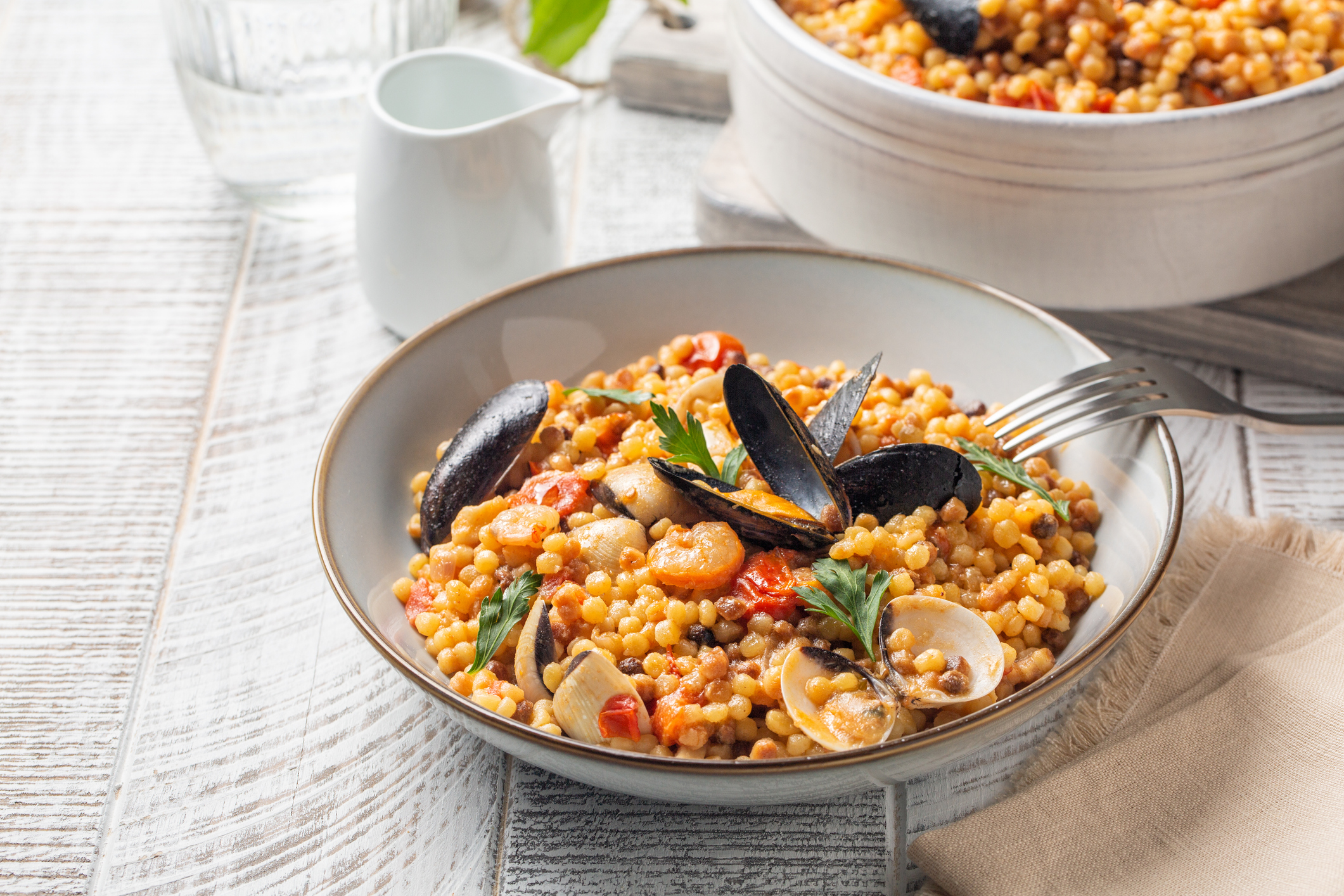 Pasta fregula con marisco